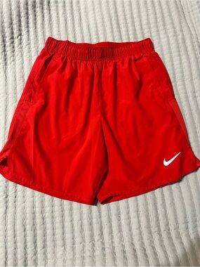 Nike Red Men's Athletic Shorts with White Swoosh